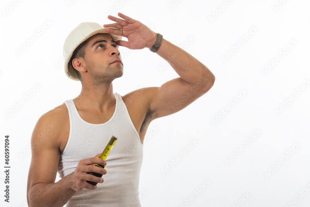 Physically fit attractive hispanic construction worker Physically fit attractive hispanic construction worker