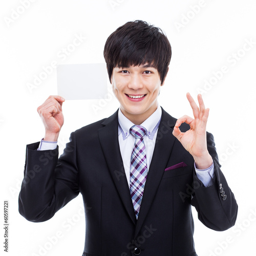 Asian business man with blank card.