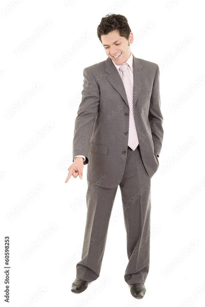 Hispanic businessman looks down at the ground Hispanic businessman looks down at the ground
