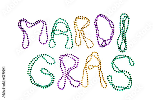 Valokuva Mardi Gras beads text on white background