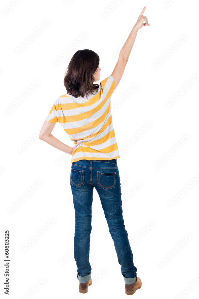 Back view of pointing woman. Back view of pointing woman.
