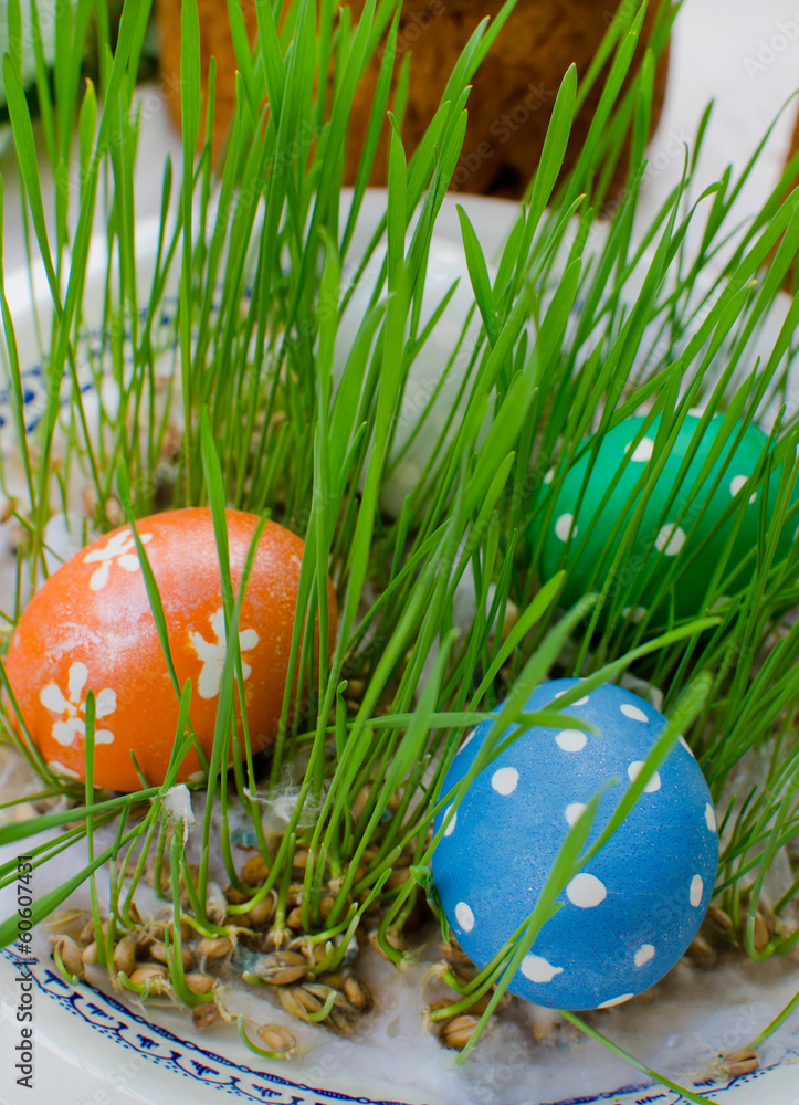 Three decorated easter eggs in the grass Three decorated easter eggs in the grass
