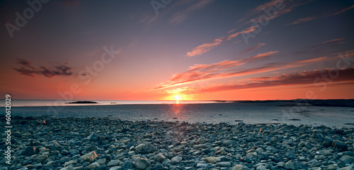 Hebrides panorama : burning sunset over a tidal beach photo