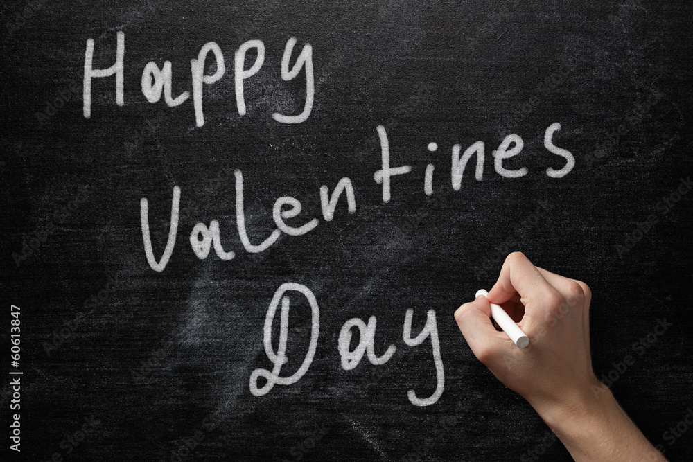 Fototapeta premium adult male hand write happy valentines day