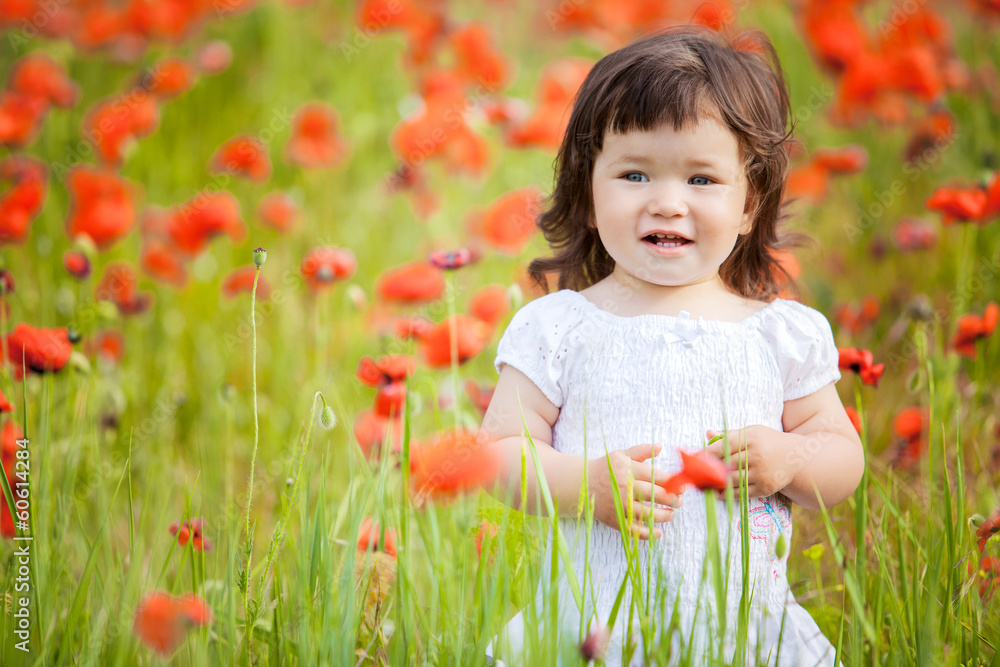 very happy child girl in poppy field very happy child girl in poppy field