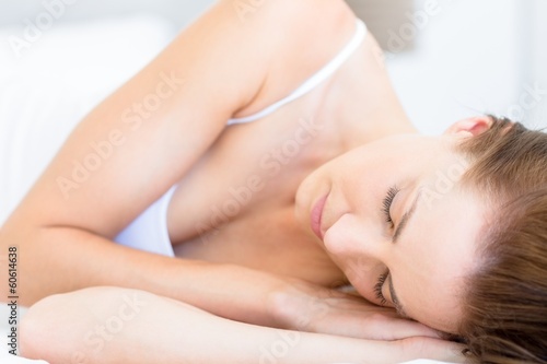 Closeup of a pretty woman sleeping in bed