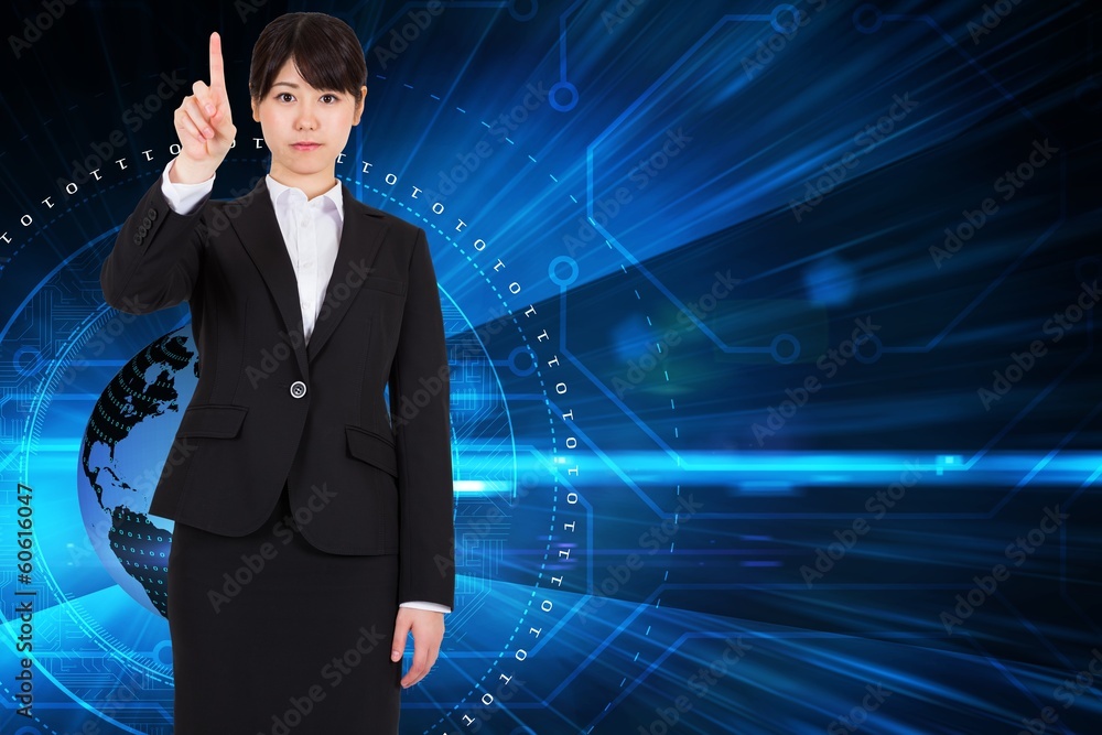 Composite image of focused businesswoman pointing Composite image of focused businesswoman pointing