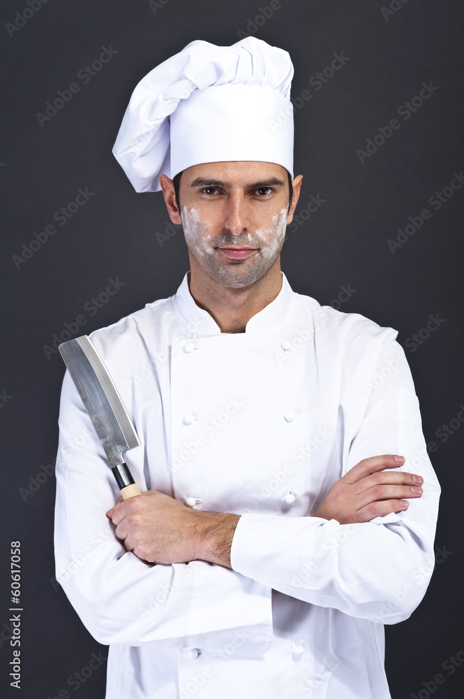 portriat of the cook over dark background portriat of the cook over dark background
