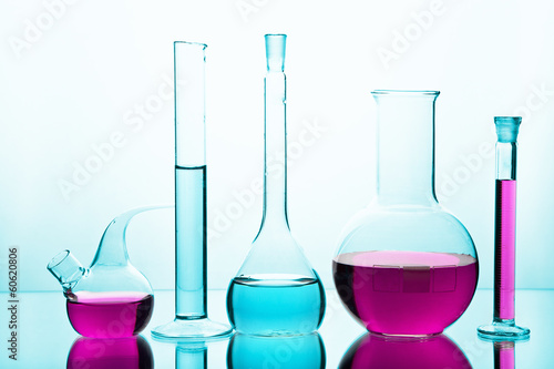 laboratory glassware with colorful chemicals