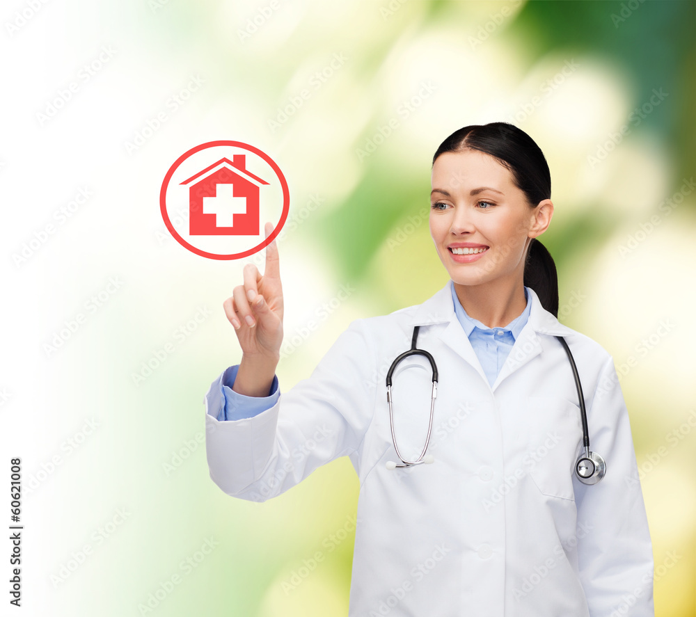 smiling female doctor pointing to hospital sign smiling female doctor pointing to hospital sign