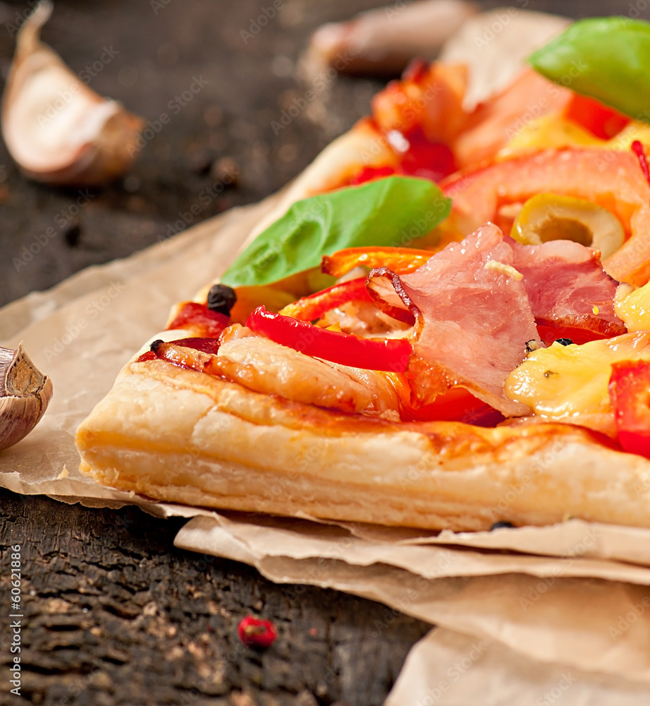 Pizza with ham, pepper and olives Pizza with ham, pepper and olives