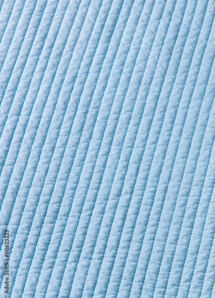 Blue cotton quilt texture background for baby boy Blue cotton quilt texture background for baby boy