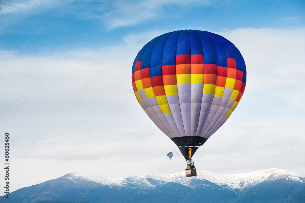 Fototapeta premium Multicolored Balloon in the blue sky