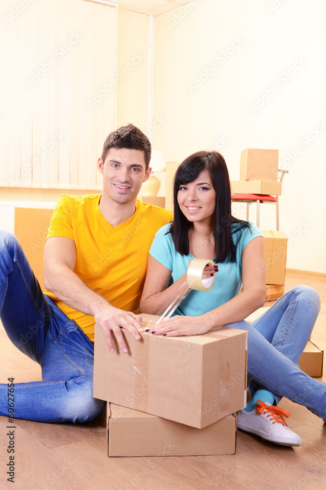 Young couple moves into new home Young couple moves into new home