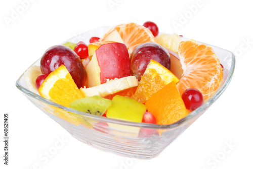 Sweet fresh fruits in bowl isolated on white