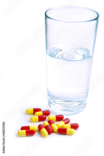 pills and glass of water