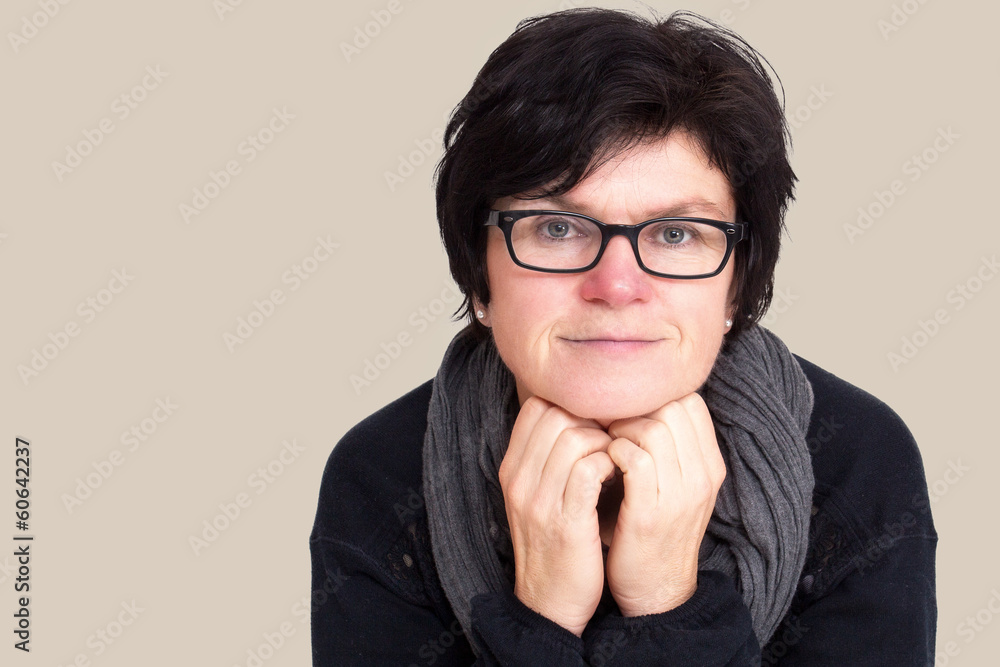 Portrait of a woman with glasses in middle age Portrait of a woman with glasses in middle age