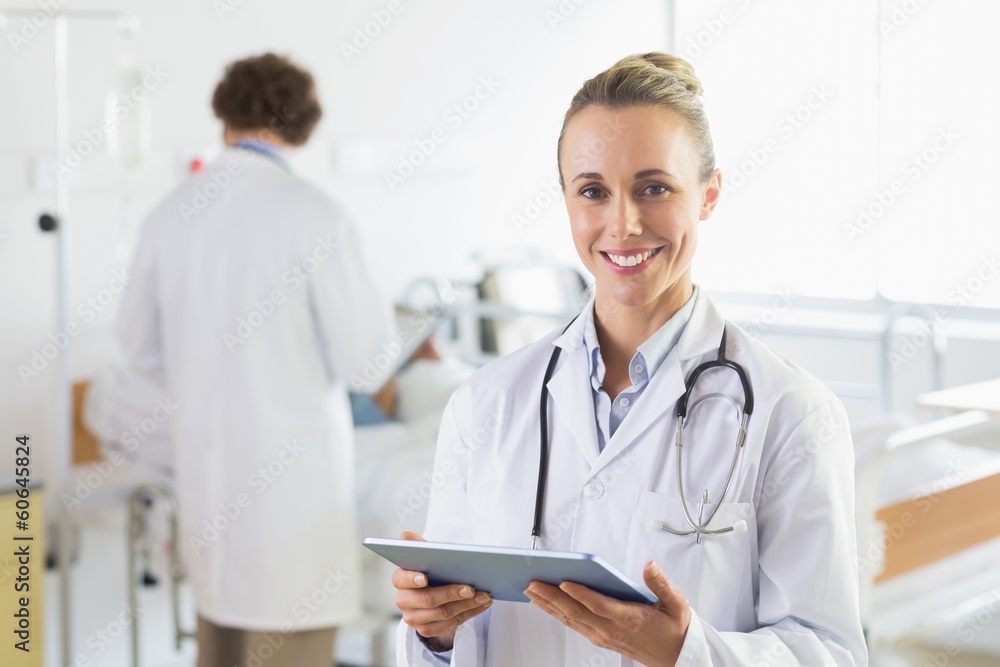 Female doctor using digital tablet Female doctor using digital tablet