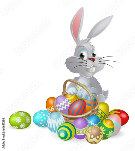 White Easter bunny and chocolate eggs