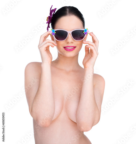 Beautiful sexy nude woman in sunglasses