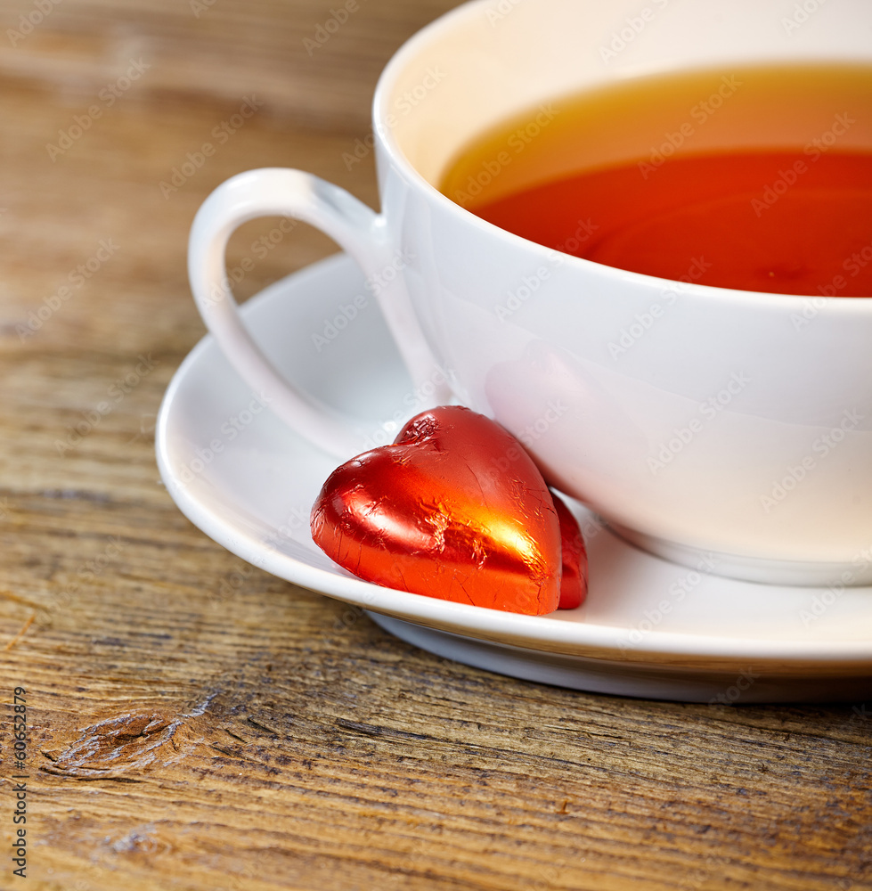 Cup of tea with lemon on the wooden table Cup of tea with lemon on the wooden table