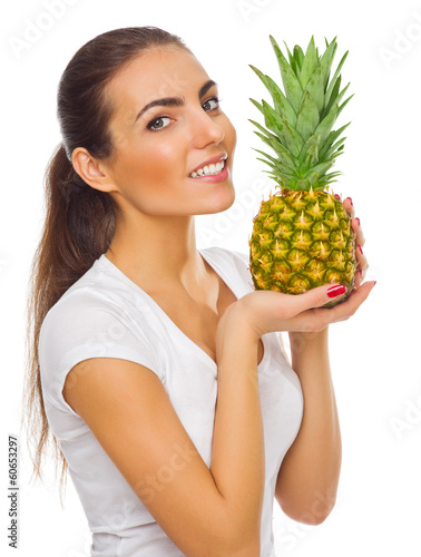 Young girl with pineapple