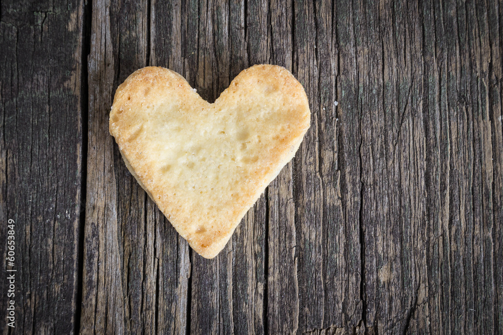 Heart of the cookies and the wooden background. Heart of the cookies and the wooden background.