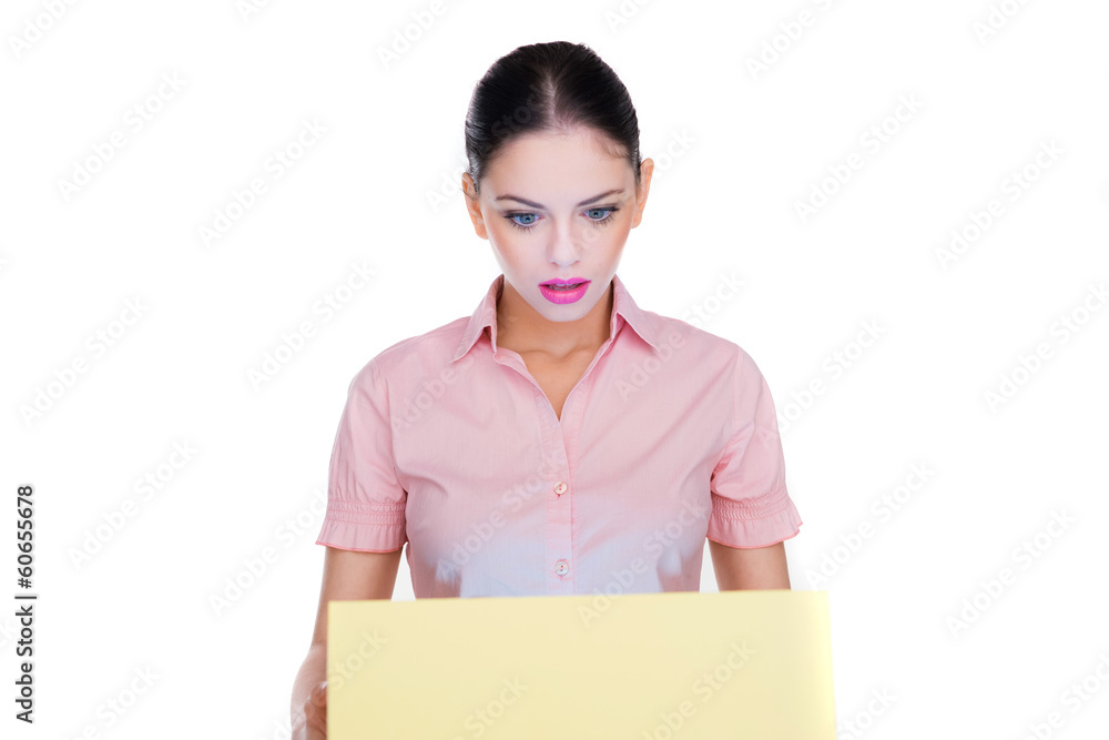 Woman looking down with a look of astonishment