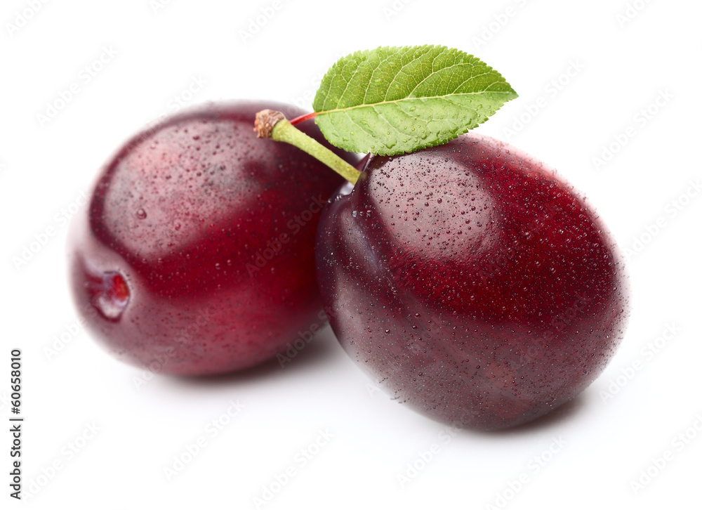 Fototapeta premium Two fresh plums