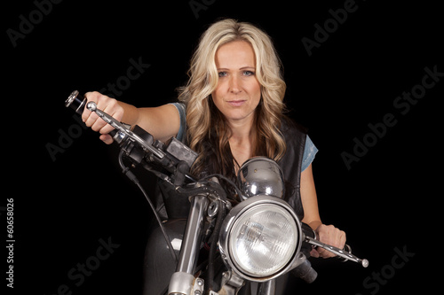 woman motorcycle on black hold handlebars smile