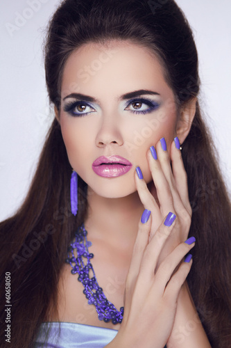 Makeup. Manicured nails. Beauty Fashion Brunette Woman Portrait. photo