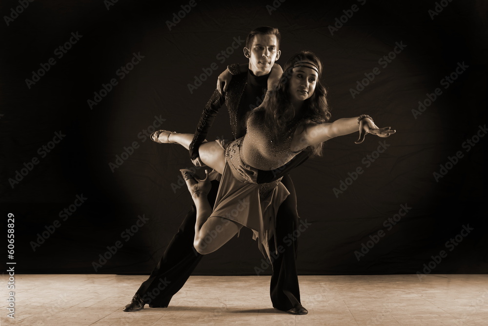 dancers in ballroom isolated on black background dancers in ballroom isolated on black background