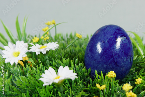 colorful easter eggs on a lawn of artificial green