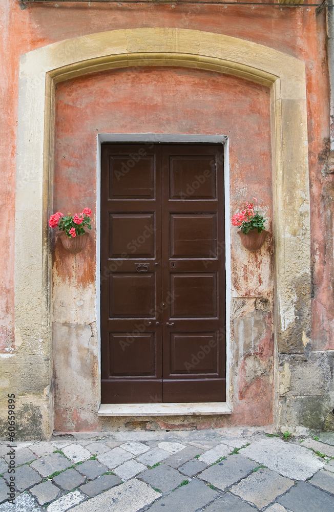 Fototapeta premium Wooden door. Tricase. Puglia. Italy.