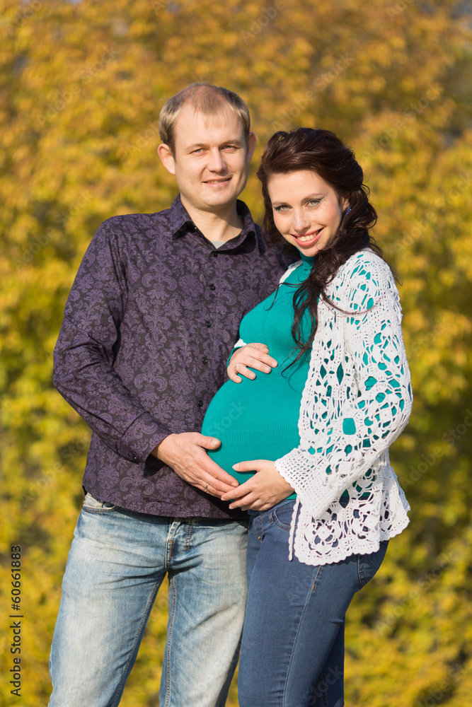 Obraz premium Attractive family in the park