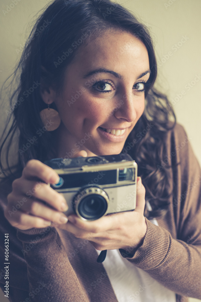 beautiful woman holding old camera beautiful woman holding old camera