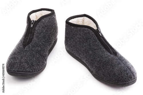 Slippers warm fur. On a white background.