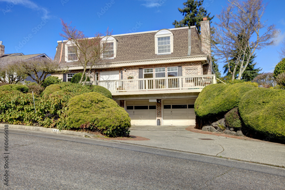 Big classic house with a balcony and arch windows Stock Photo | Adobe Stock