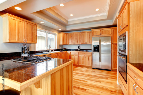 Bright wood kitchen with coffered ceiling