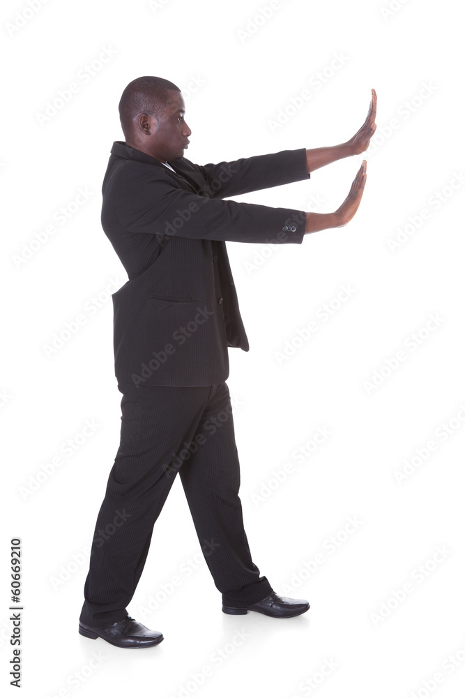 African Man Pushing Copyspace African Man Pushing Copyspace