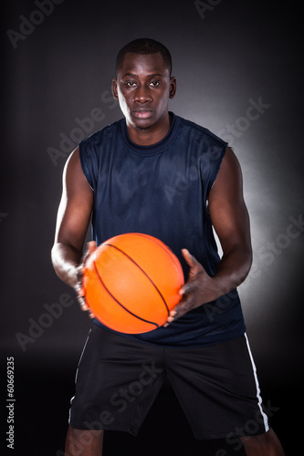 African Young Man With Basketball