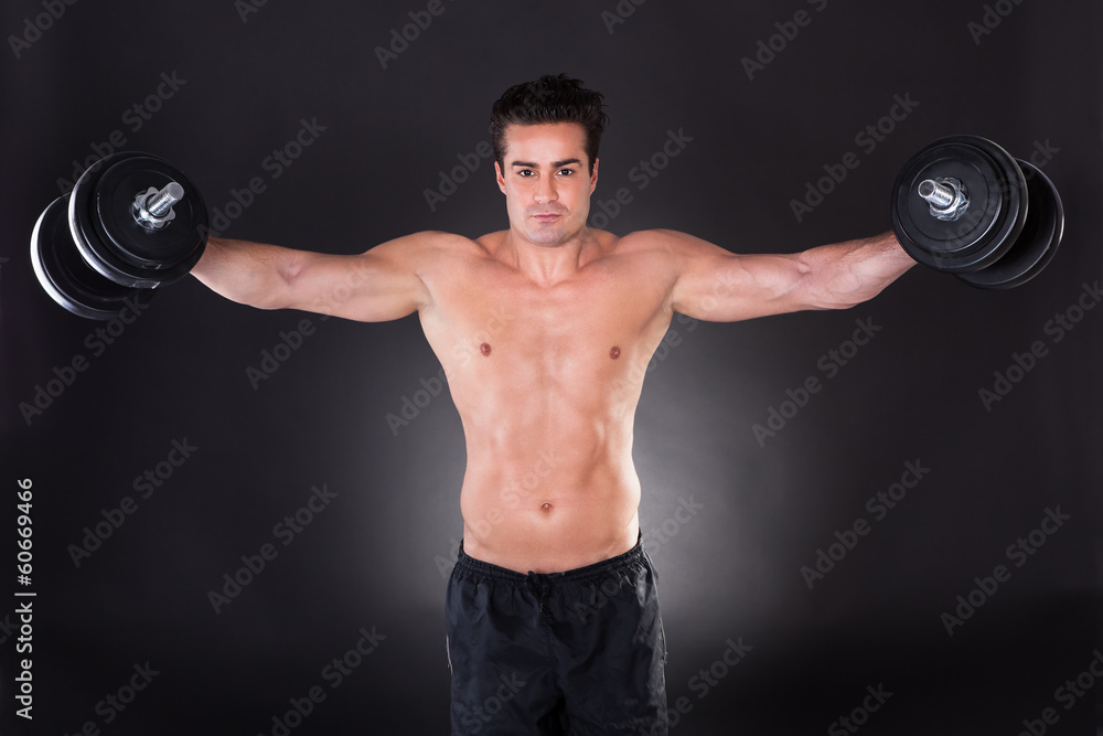 Man Exercising Dumbbells Man Exercising Dumbbells