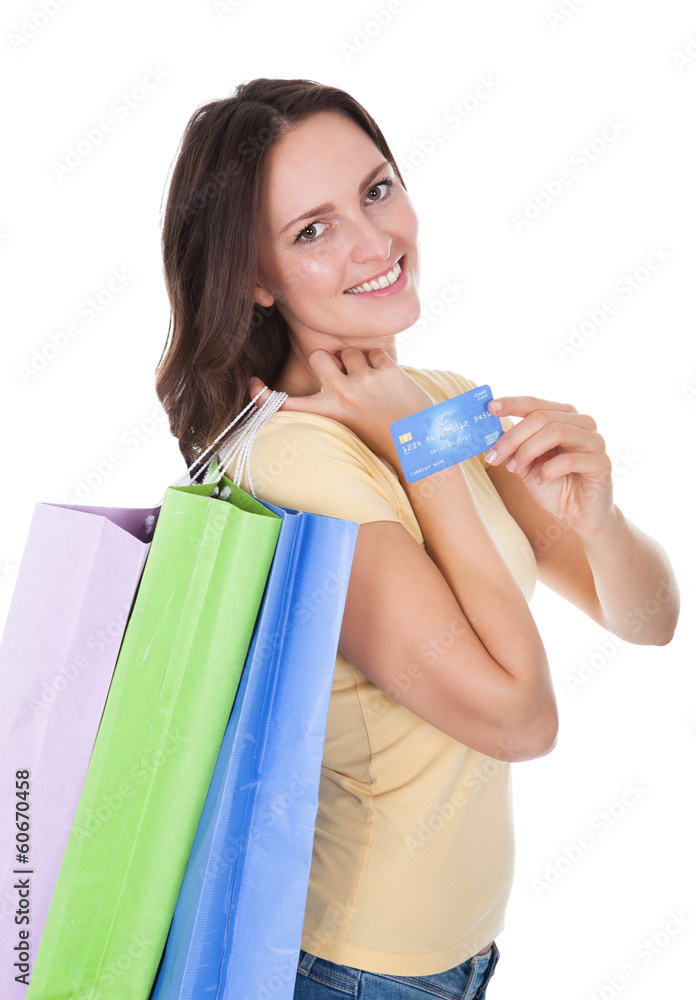 Woman With Shopping Bags Holding Credit Card