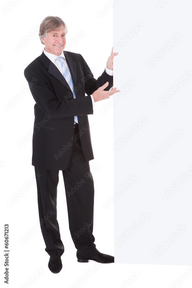 Mature Businessman With Billboard Mature Businessman With Billboard