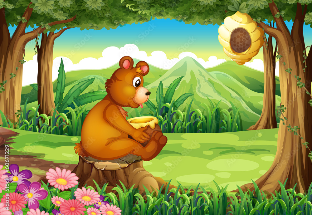 Obraz premium A bear at the forest near the beehive