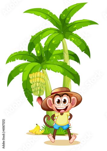 A very happy monkey near the banana plant