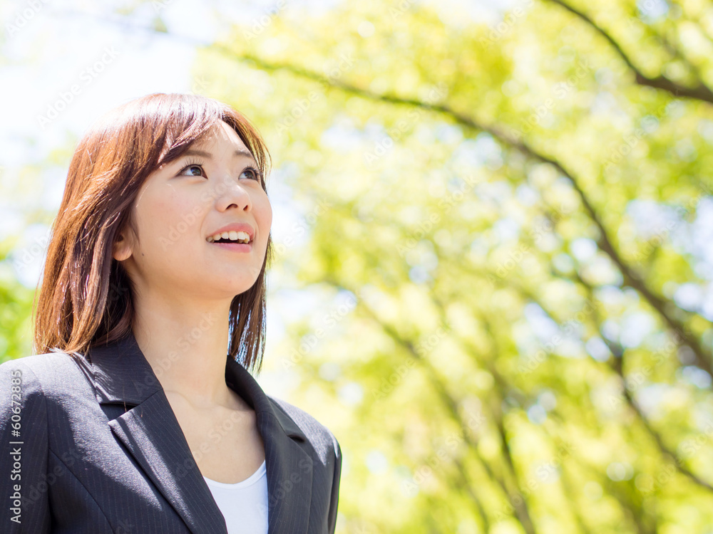young asisn businesswoman in the park young asisn businesswoman in the park