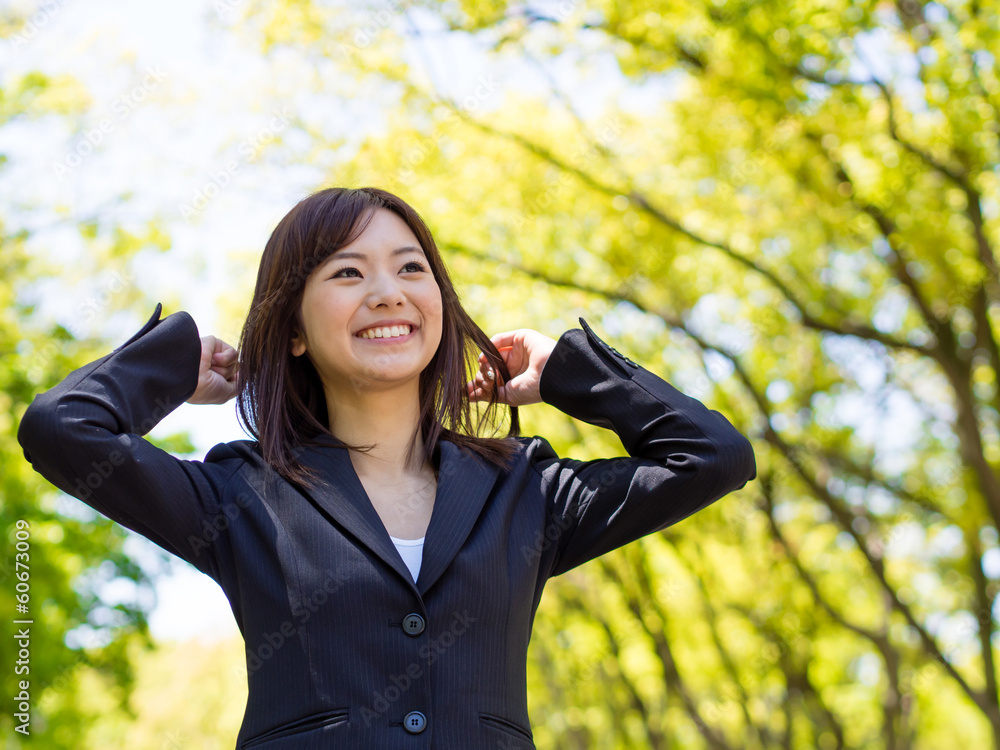 young asisn businesswoman in the park young asisn businesswoman in the park