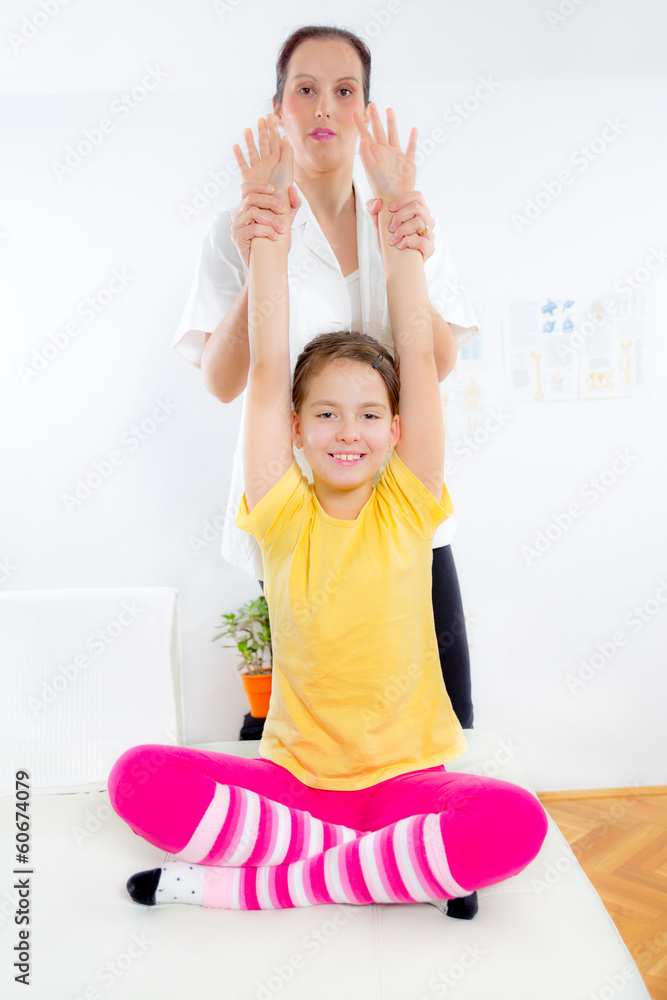 Chiropractor doing adjustment on female patient Chiropractor doing adjustment on female patient