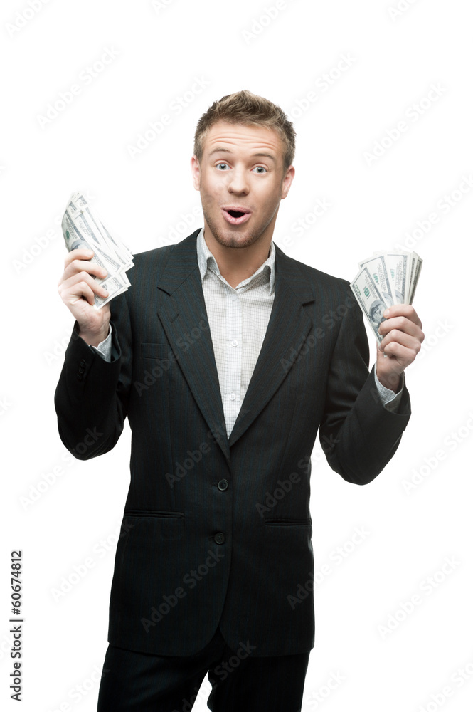 young surprised businessman holding money young surprised businessman holding money